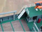 Companionways and ladders are etched brass. One of the smaller winches can just be seen under the overhang.